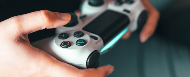 Person holding a gamepad